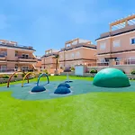 Apartment Punta Prima Indoor & Outdoor Pool